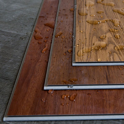 বিলাসবহুল ৭মিমি ৮মিমি এসপিসি ফ্লোরিং বিনামূল্যে নমুনা জলরোধী ক্লিক লক রিজিড ভিনাইল প্ল্যাঙ্ক ইনডোর জিম অফিস ব্যবহারের জন্য